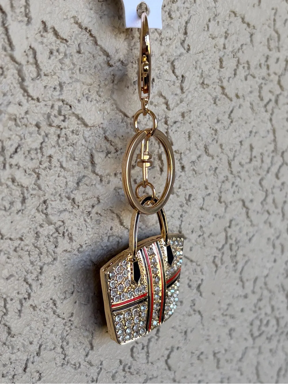 Sparkling Gold Crystal Tote Bag Keychain with Red & Black Stripes